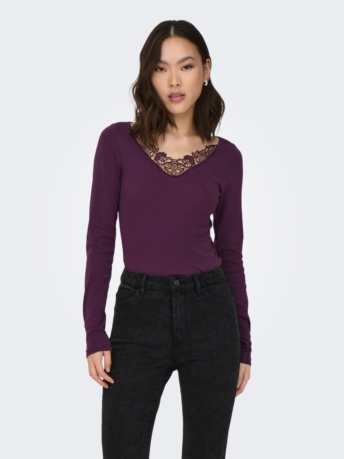 Long sleeved top with lace neck