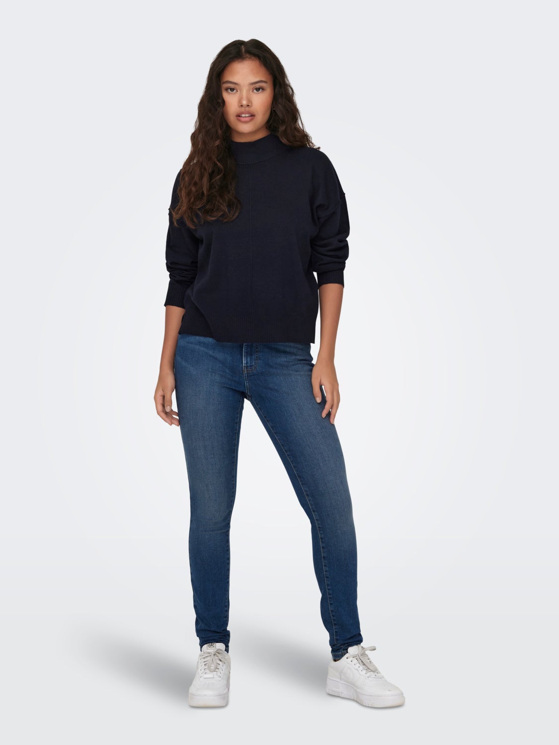 Knitted pullover with high neck