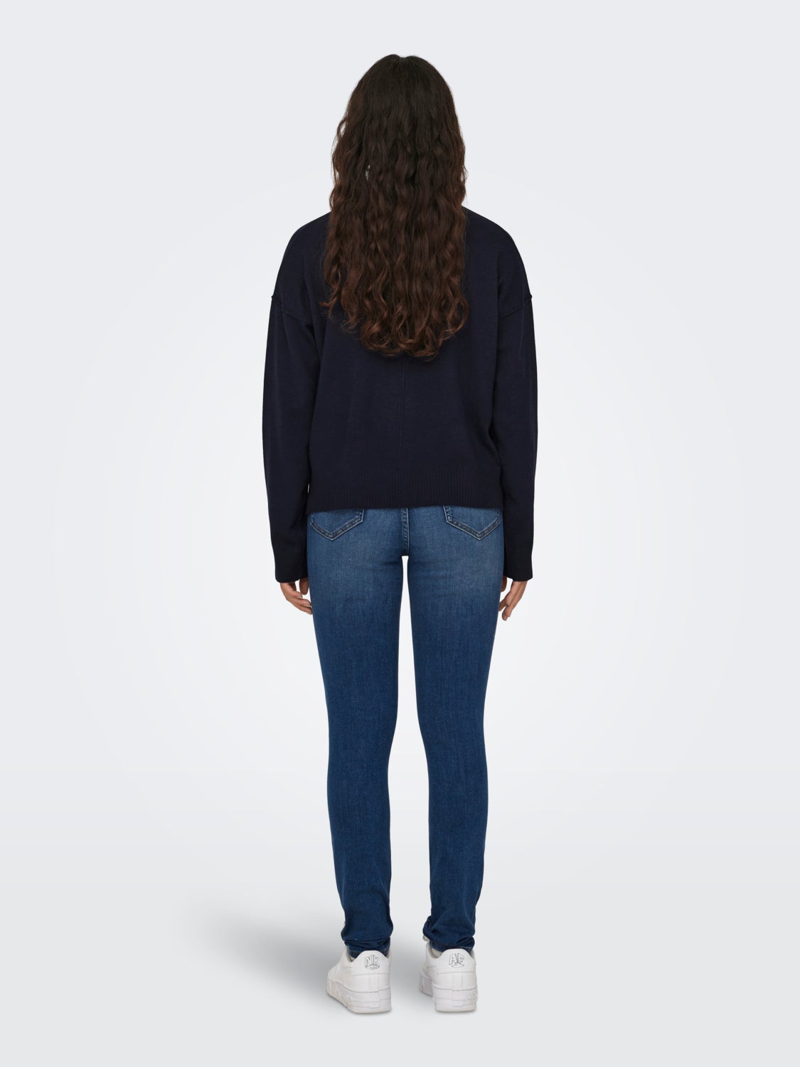 Knitted pullover with high neck