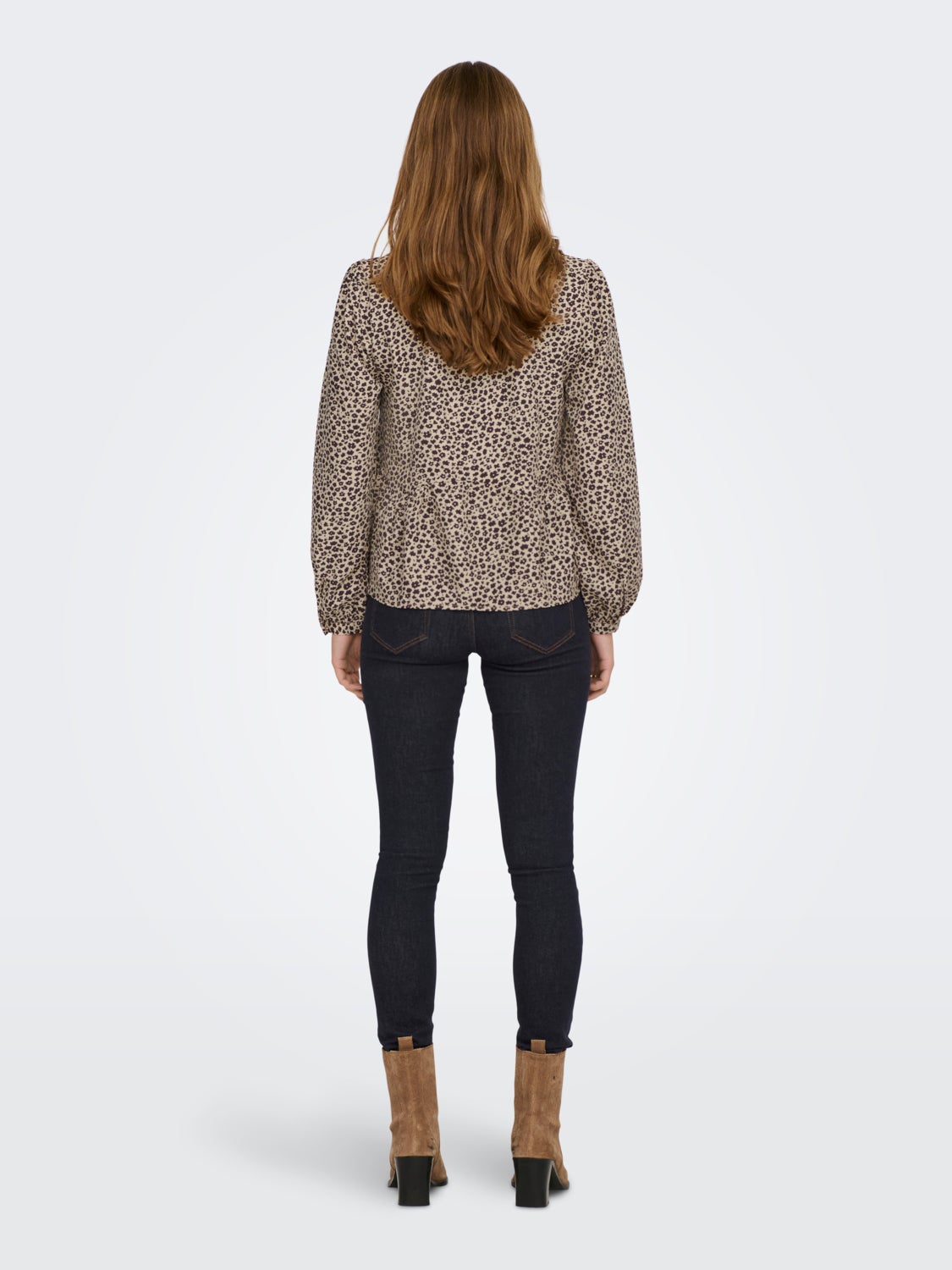 Peplum Long Sleeved Top