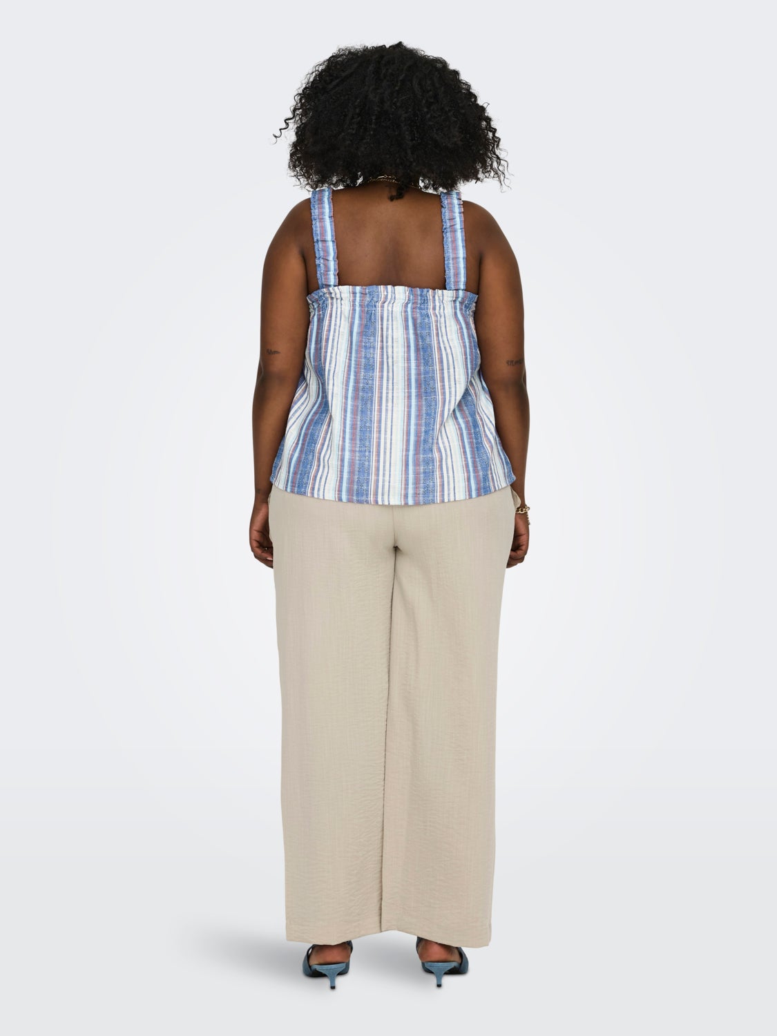 Curvy smock detail top