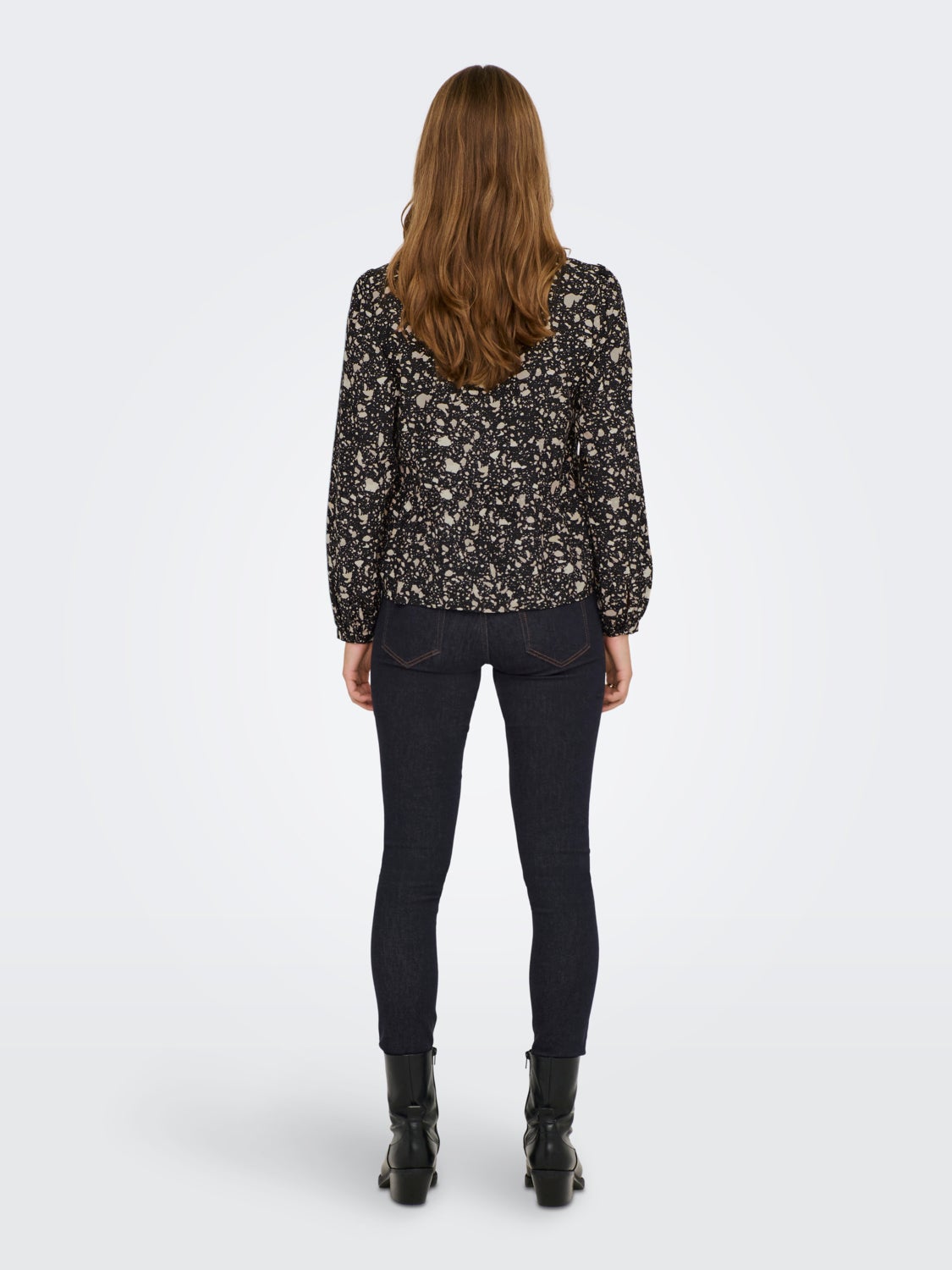 Peplum Long Sleeved Top