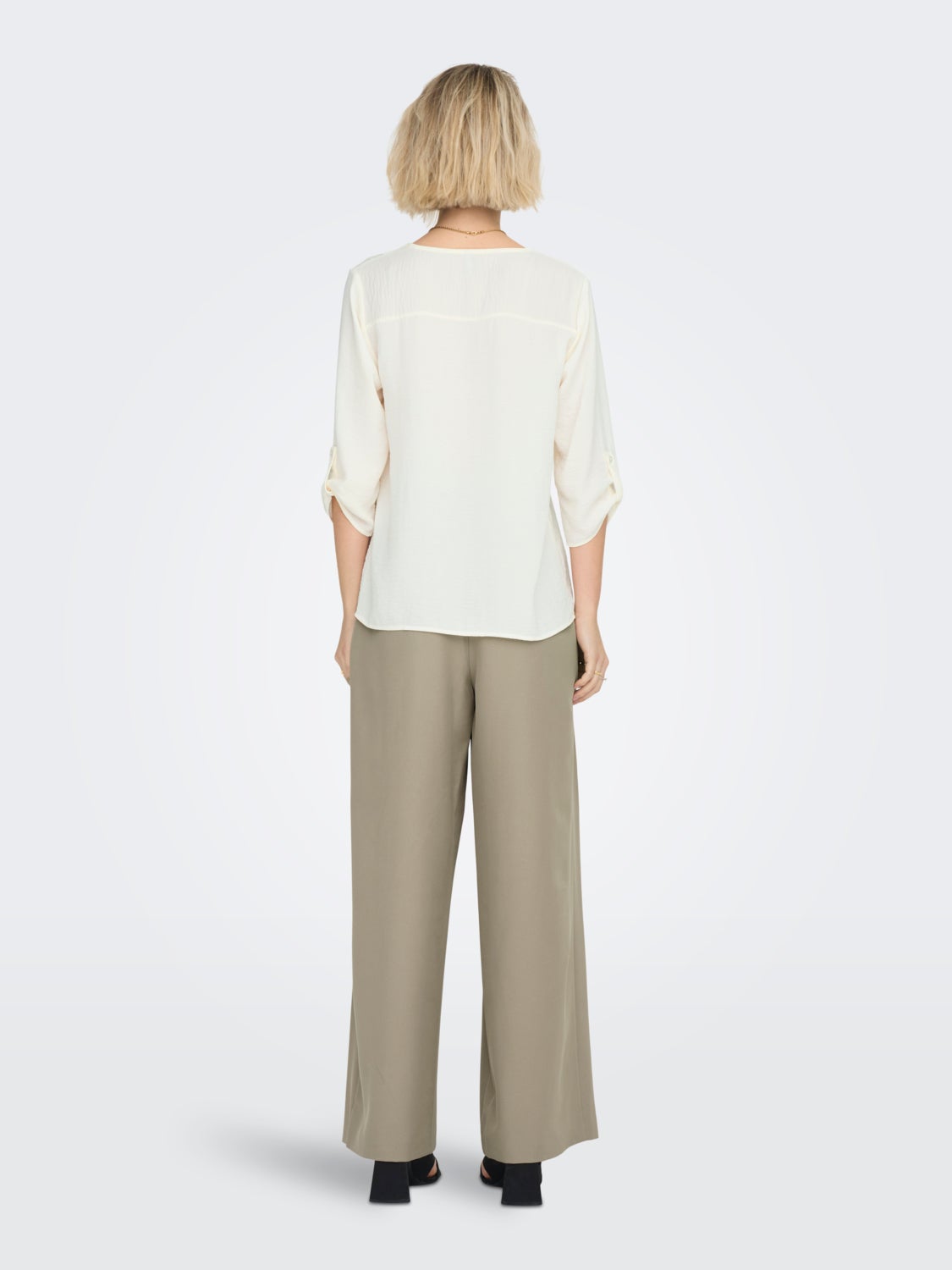 Solid colored 3/4 sleeved top