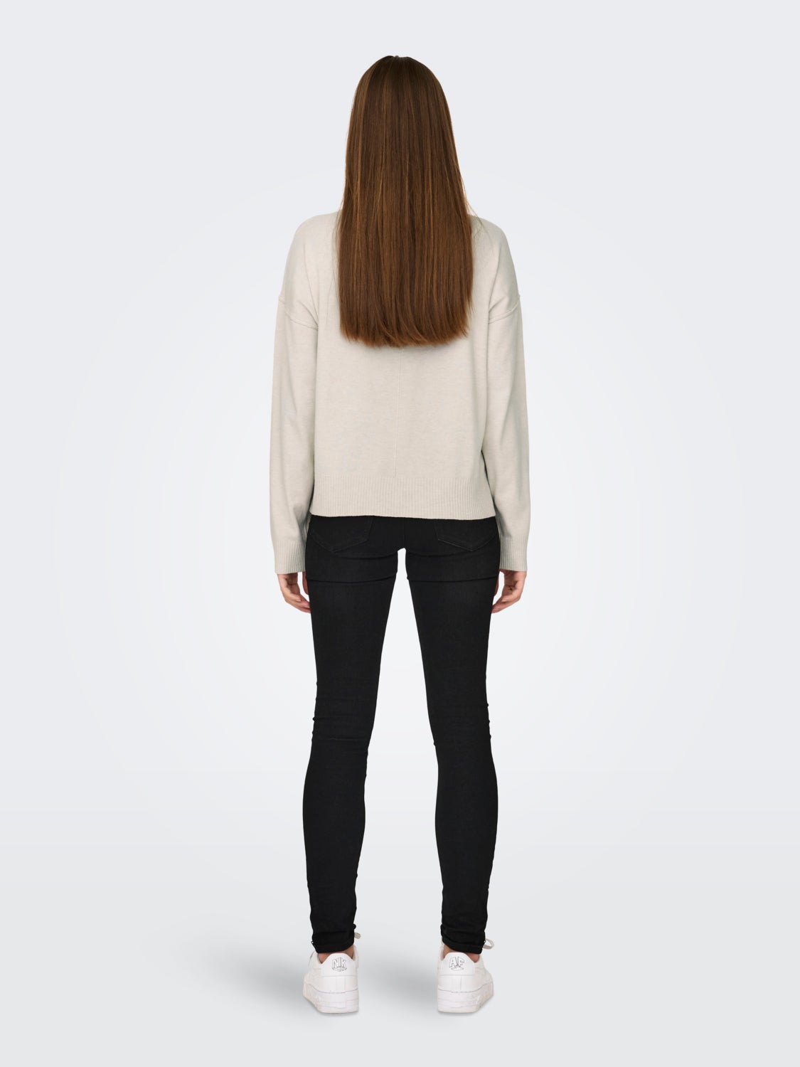 Knitted pullover with high neck