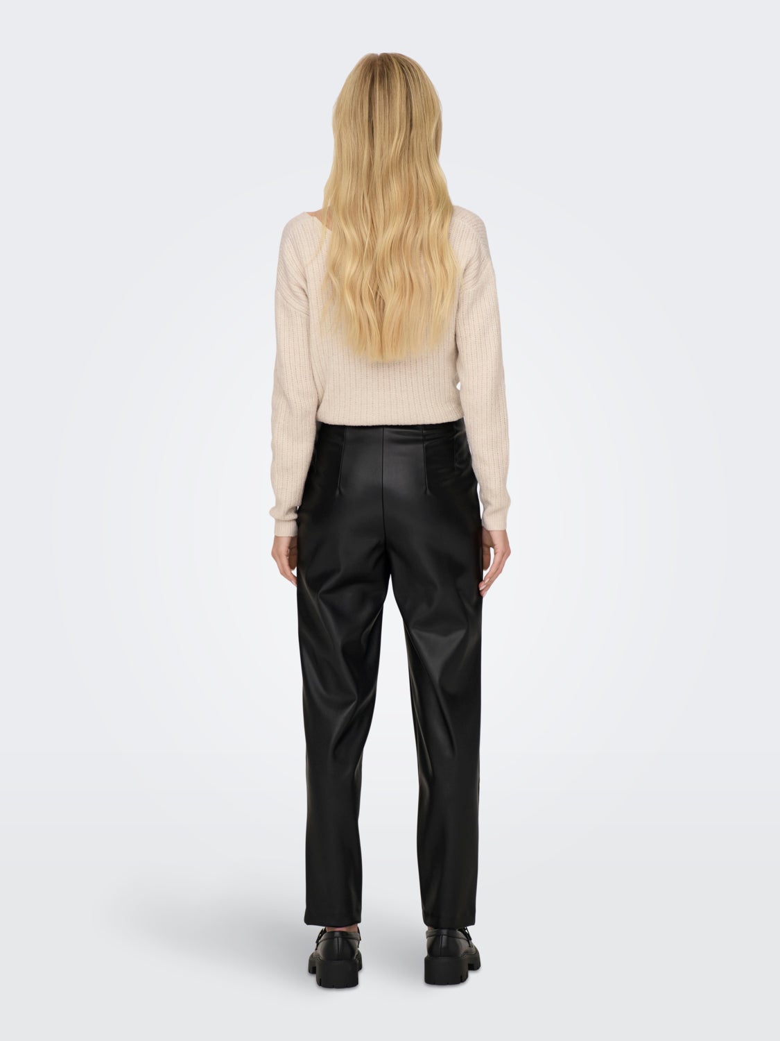 High waisted pants of faux leather