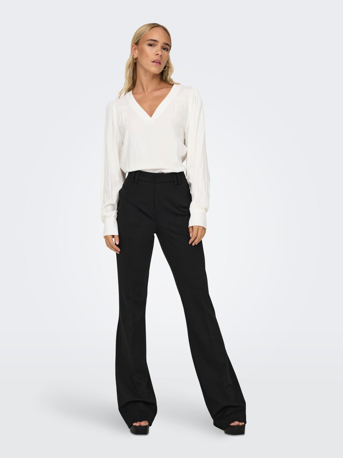 Trousers with flared fit