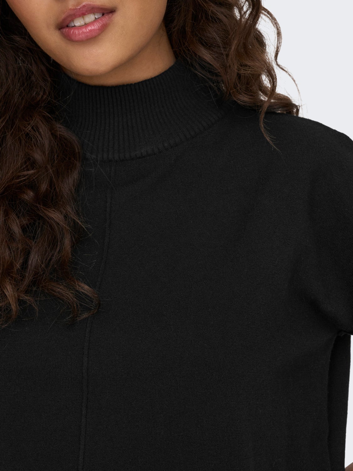 Knitted pullover with high neck