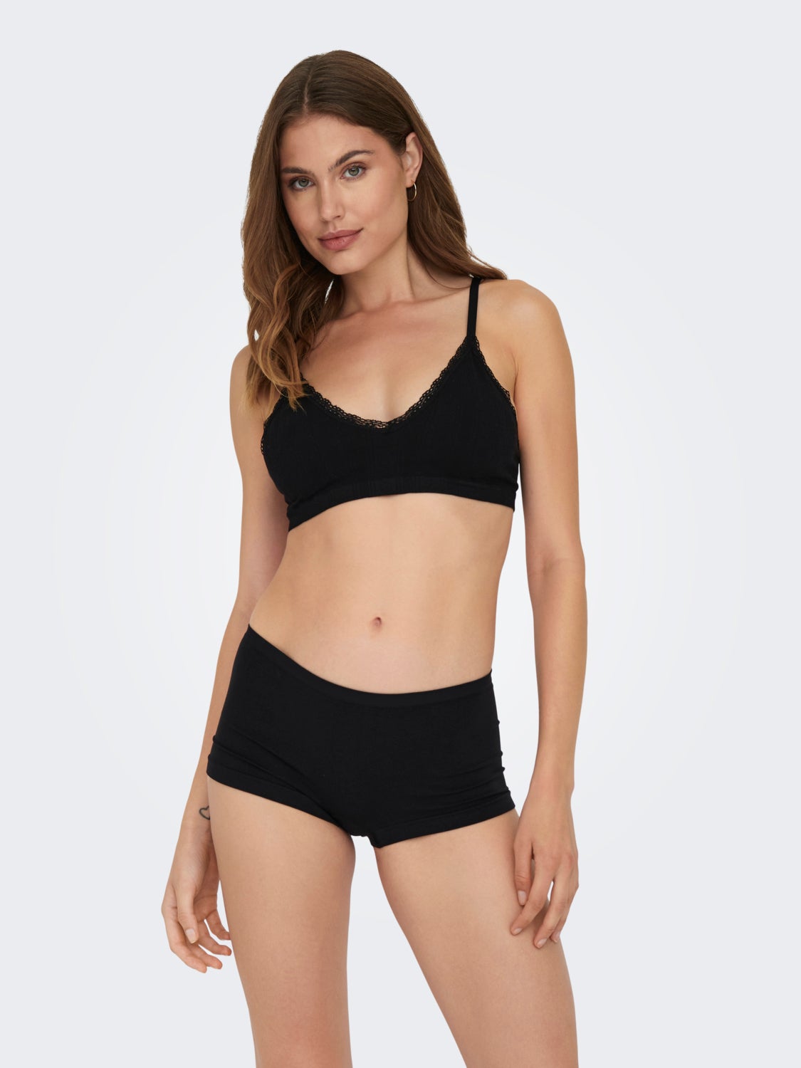 Adjustable bra with lace edge