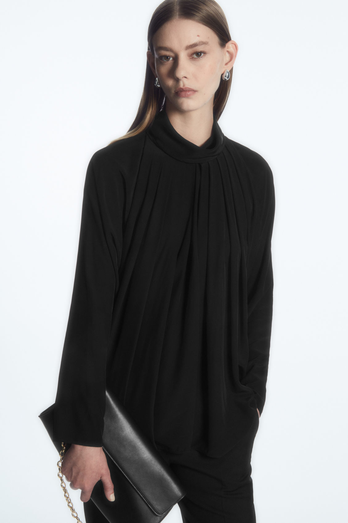 PLEATED BATWING BLOUSE