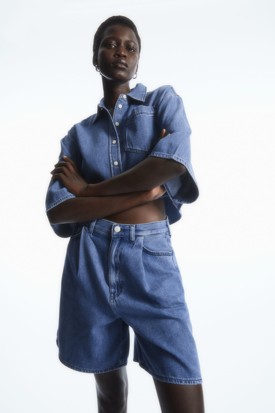 PLEATED A-LINE DENIM SHORTS