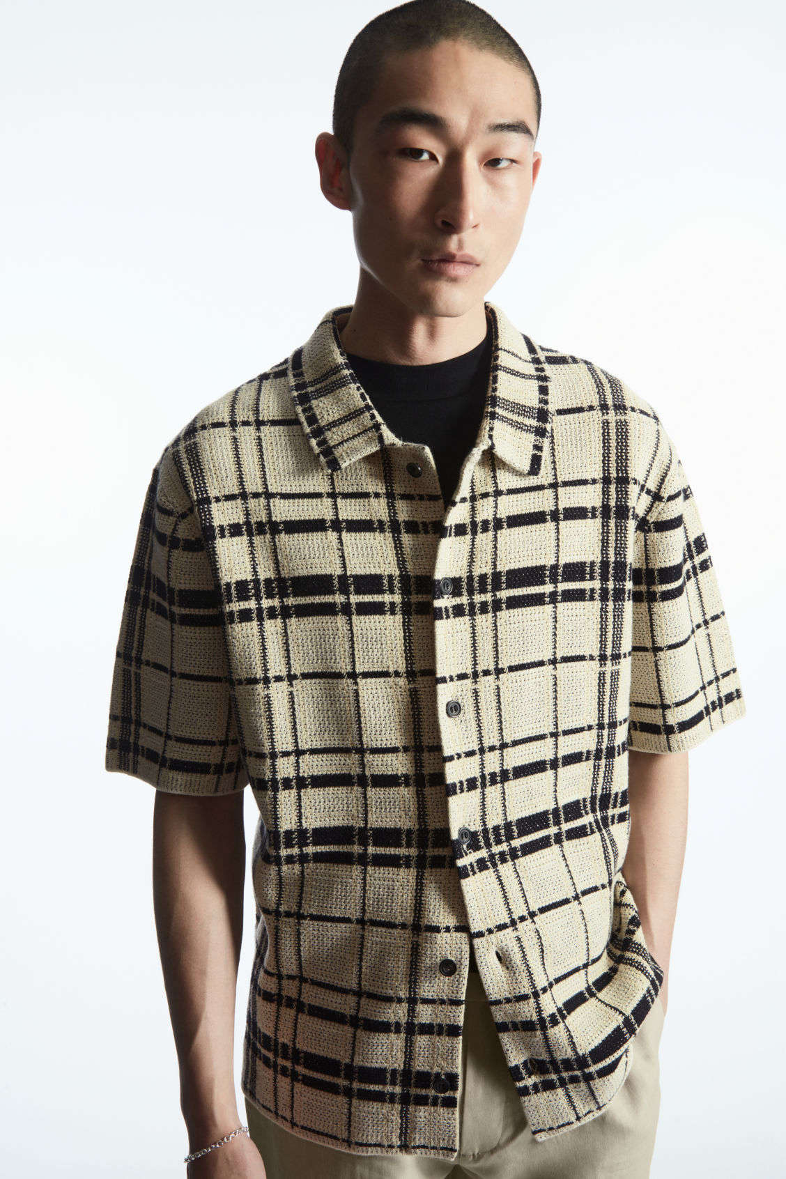 CHECKED KNITTED SHORT-SLEEVED SHIRT