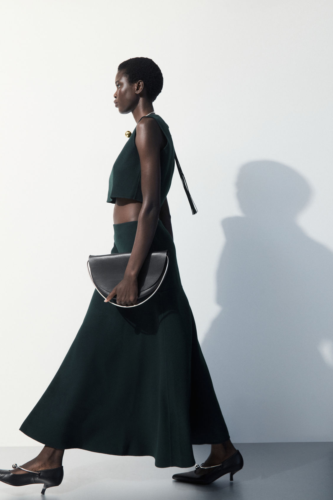 THE WOOL-BLEND MIDI SKIRT