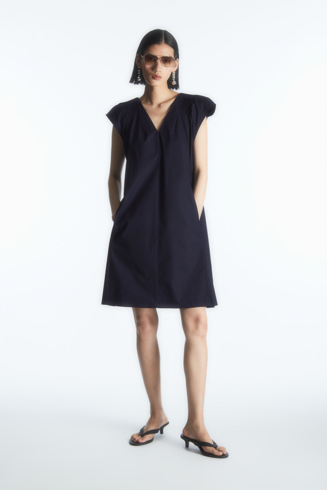 SMOCKED V-NECK MINI DRESS