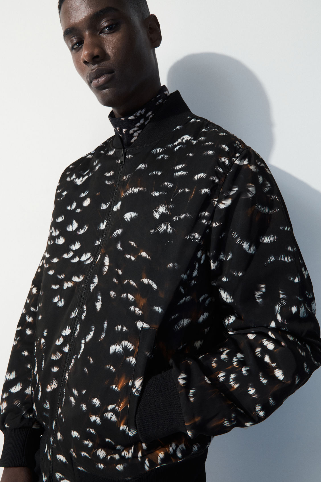 THE FEATHER-PRINT BOMBER JACKET