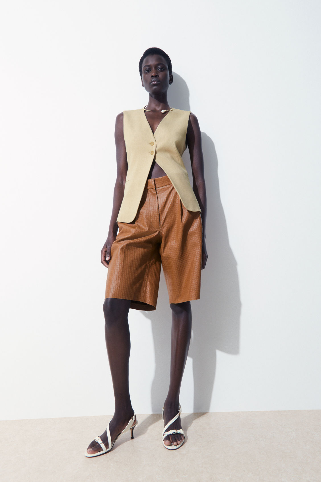 THE EMBOSSED-LEATHER BERMUDA SHORTS