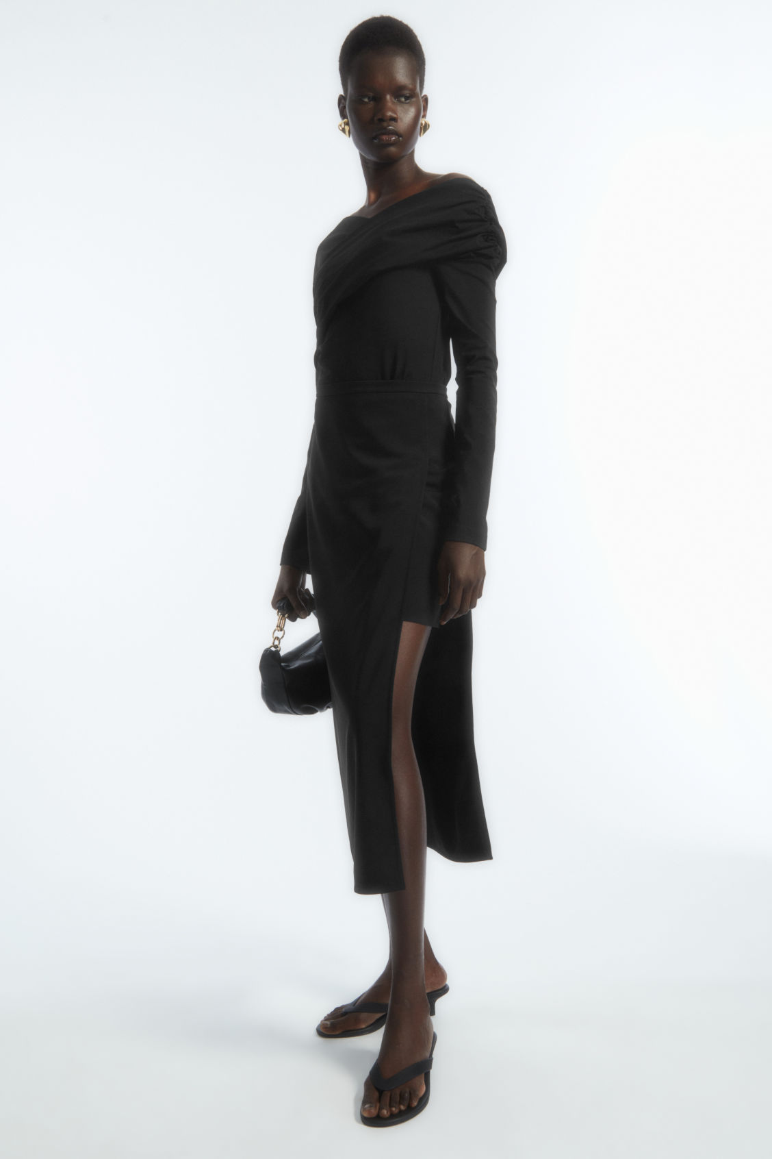 ASYMMETRIC CUTOUT SKIRT