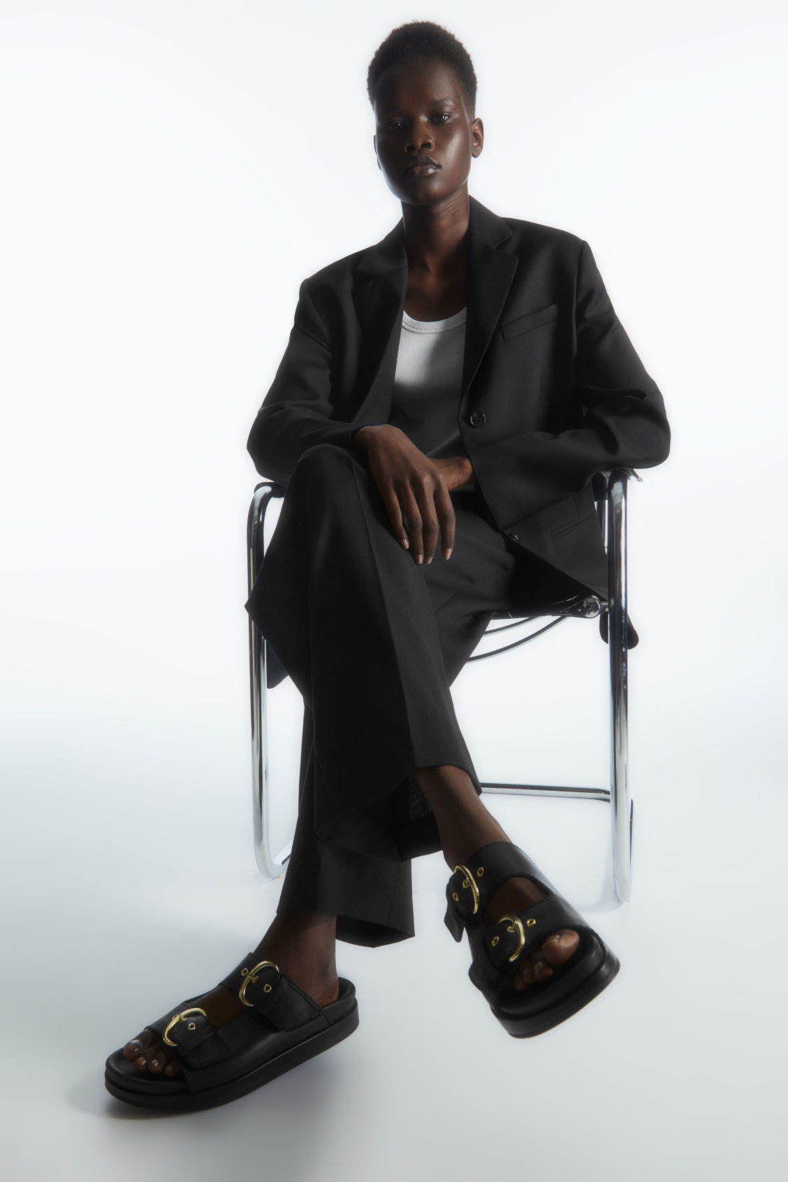 CHUNKY BUCKLED LEATHER SLIDES