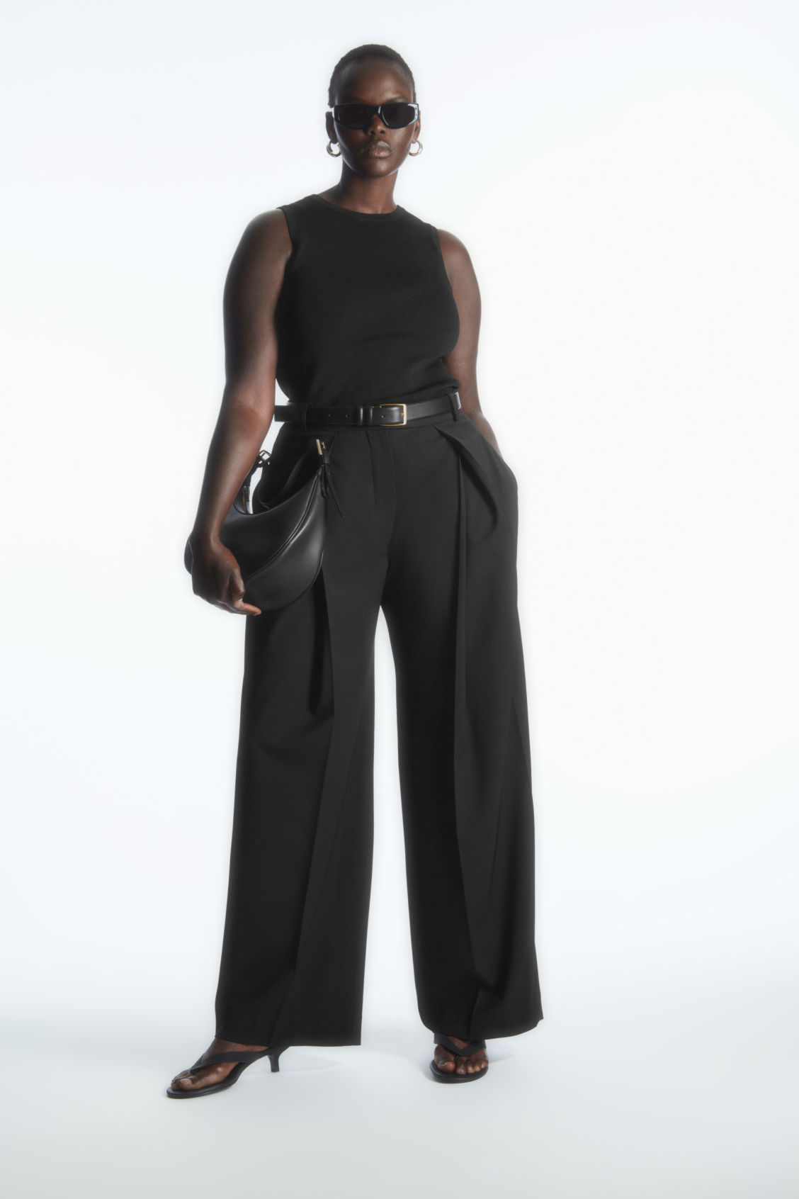 WIDE-LEG PLEATED WOOL TROUSERS