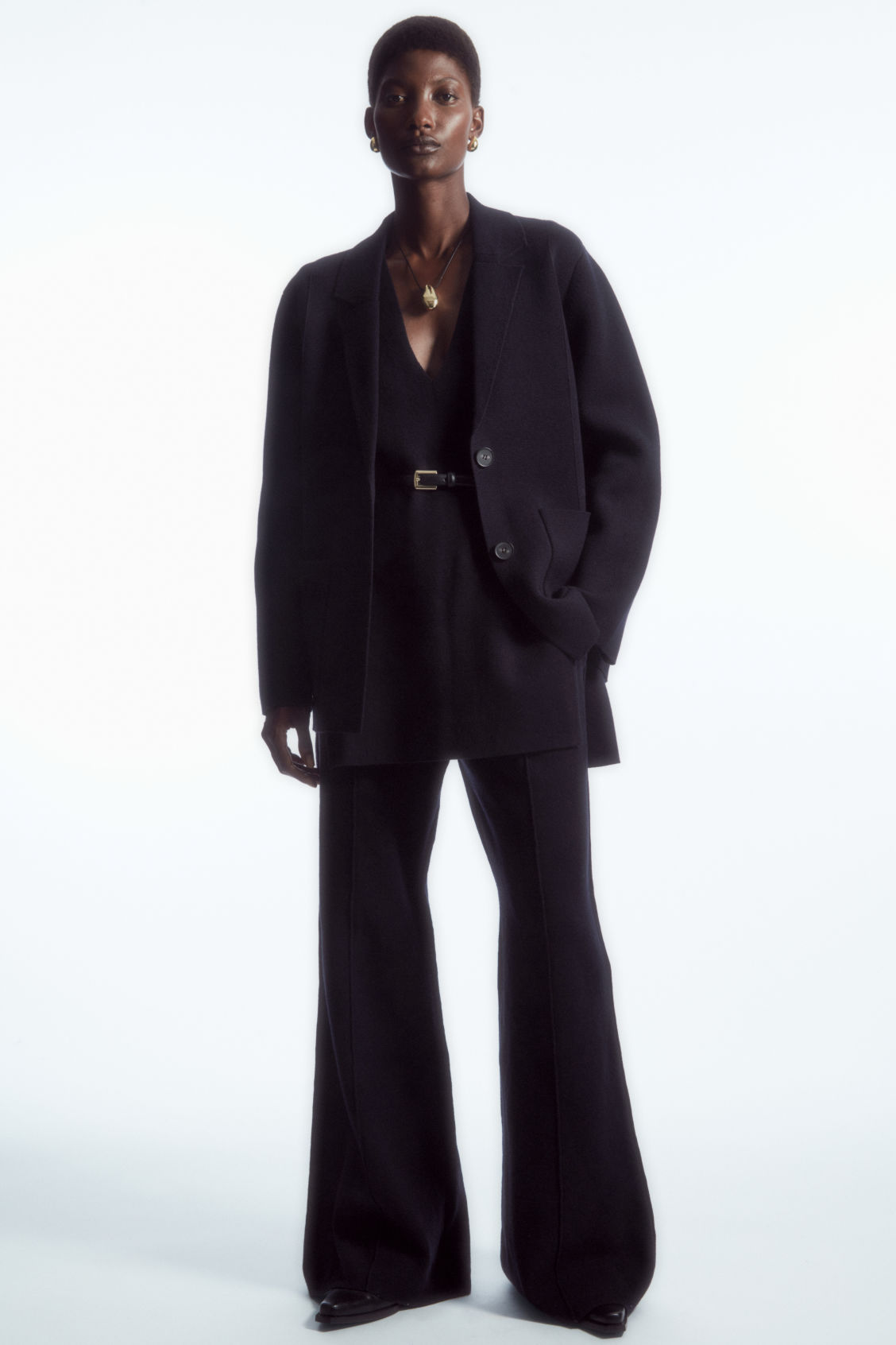 FLARED KNITTED WOOL TROUSERS