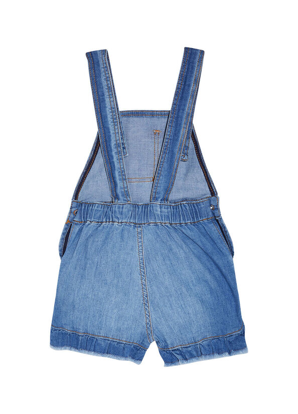 Salopette di jeans con spilla