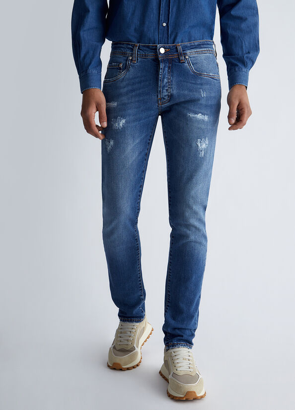 Jeans slim fit effetto used