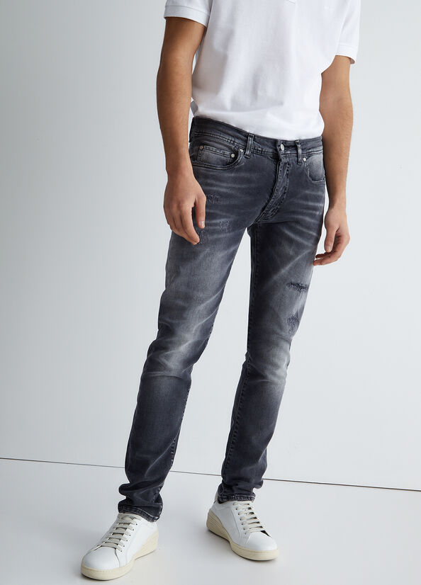Jeans slim fit effetto used
