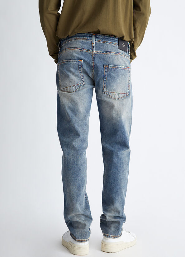 Jeans slim fit effetto used