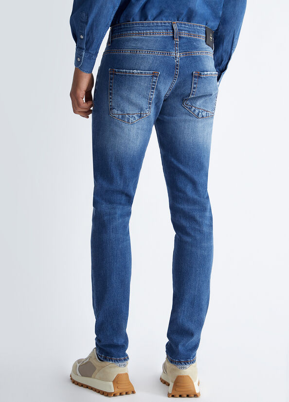 Jeans slim fit effetto used