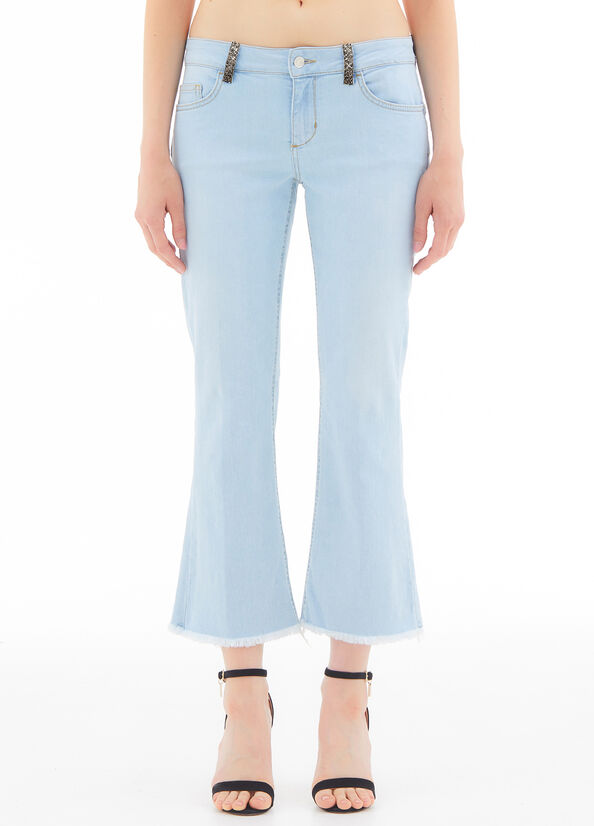 Jeans flare con glitter