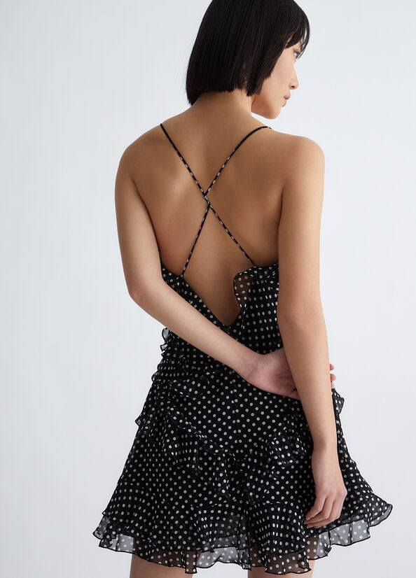 Vestito nero a pois