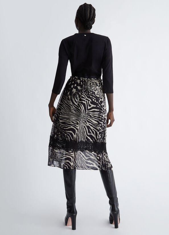 Vestito nero con gonna animalier