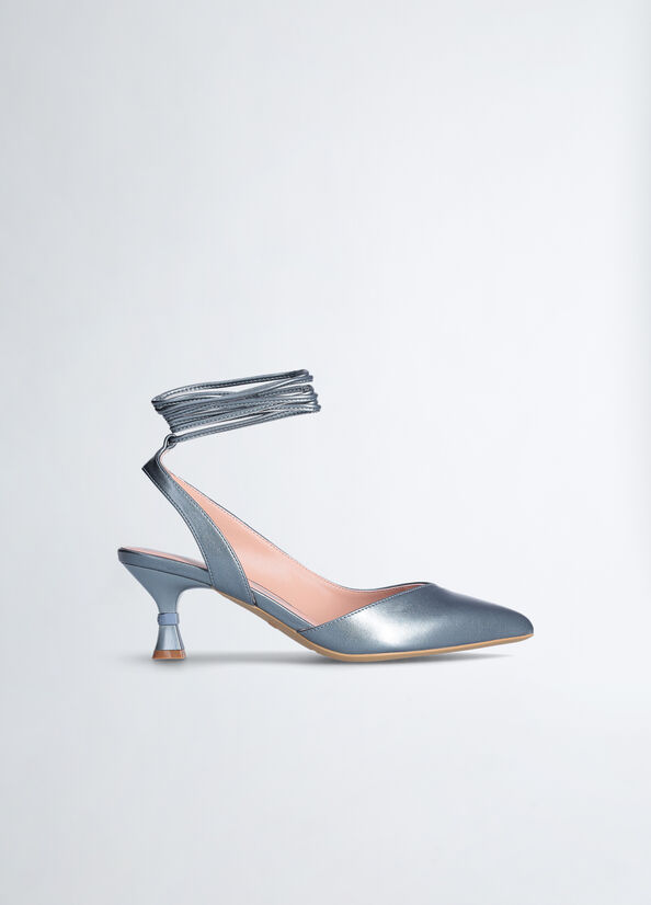 Sling back con tacco a clessidra