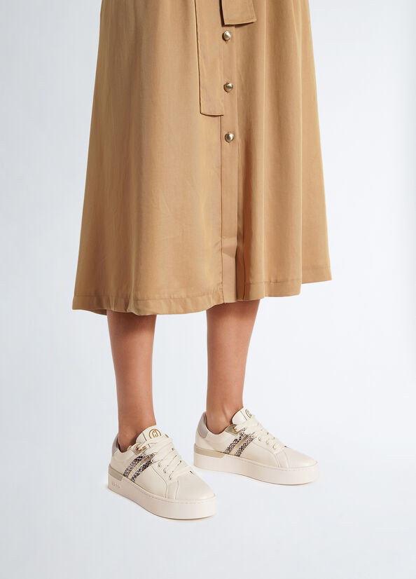 Sneakers con stampa pitone