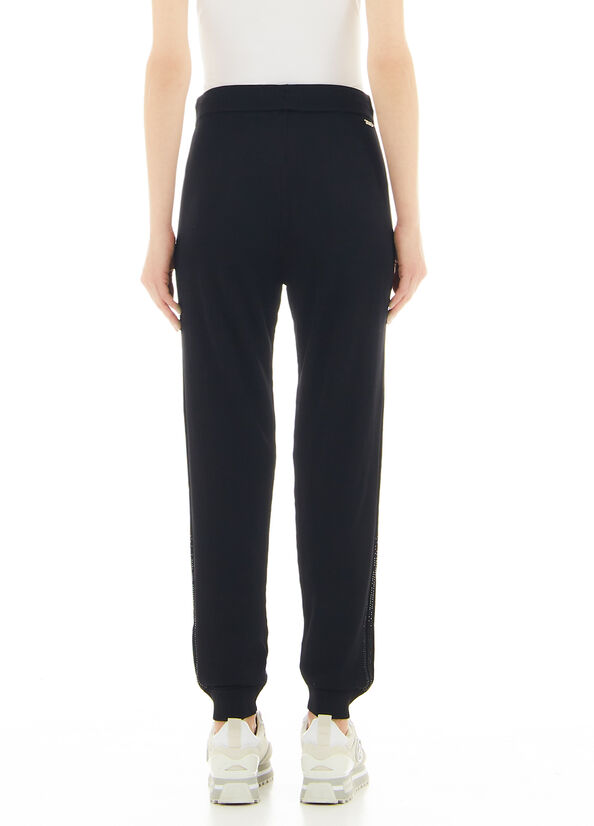 Pantaloni in maglia con applicazioni