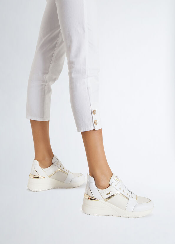 Sneakers in pelle con zeppa