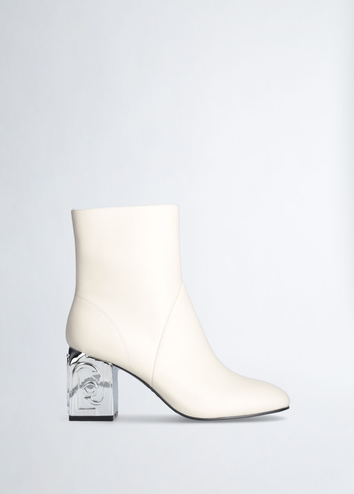 White leather ankle boots