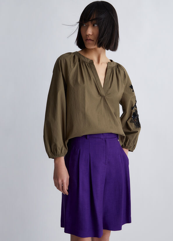 Blusa con ricamo e paillettes