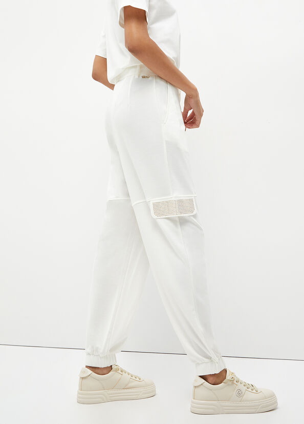 Pantaloni cargo con borchie