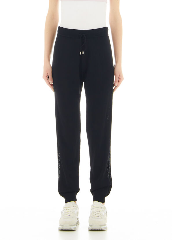 Pantaloni in maglia con applicazioni