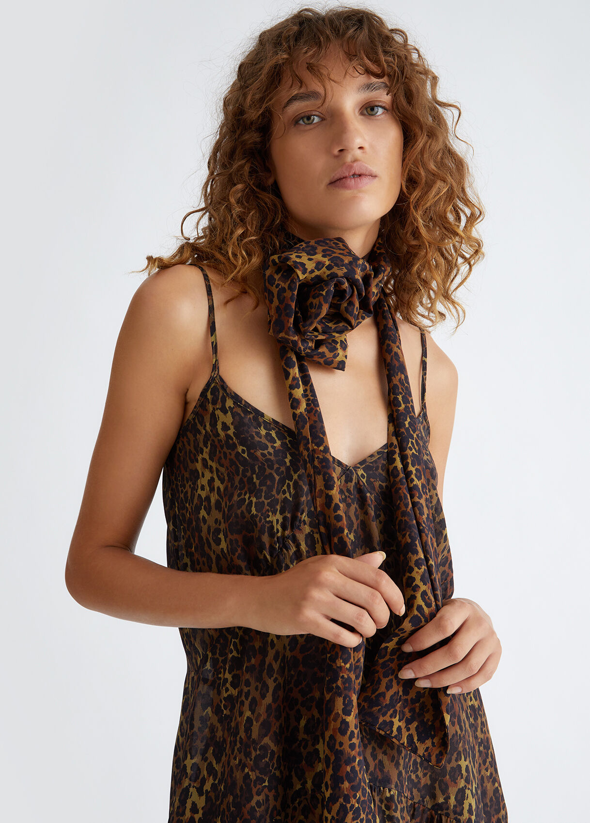 Silk scarf with brooch