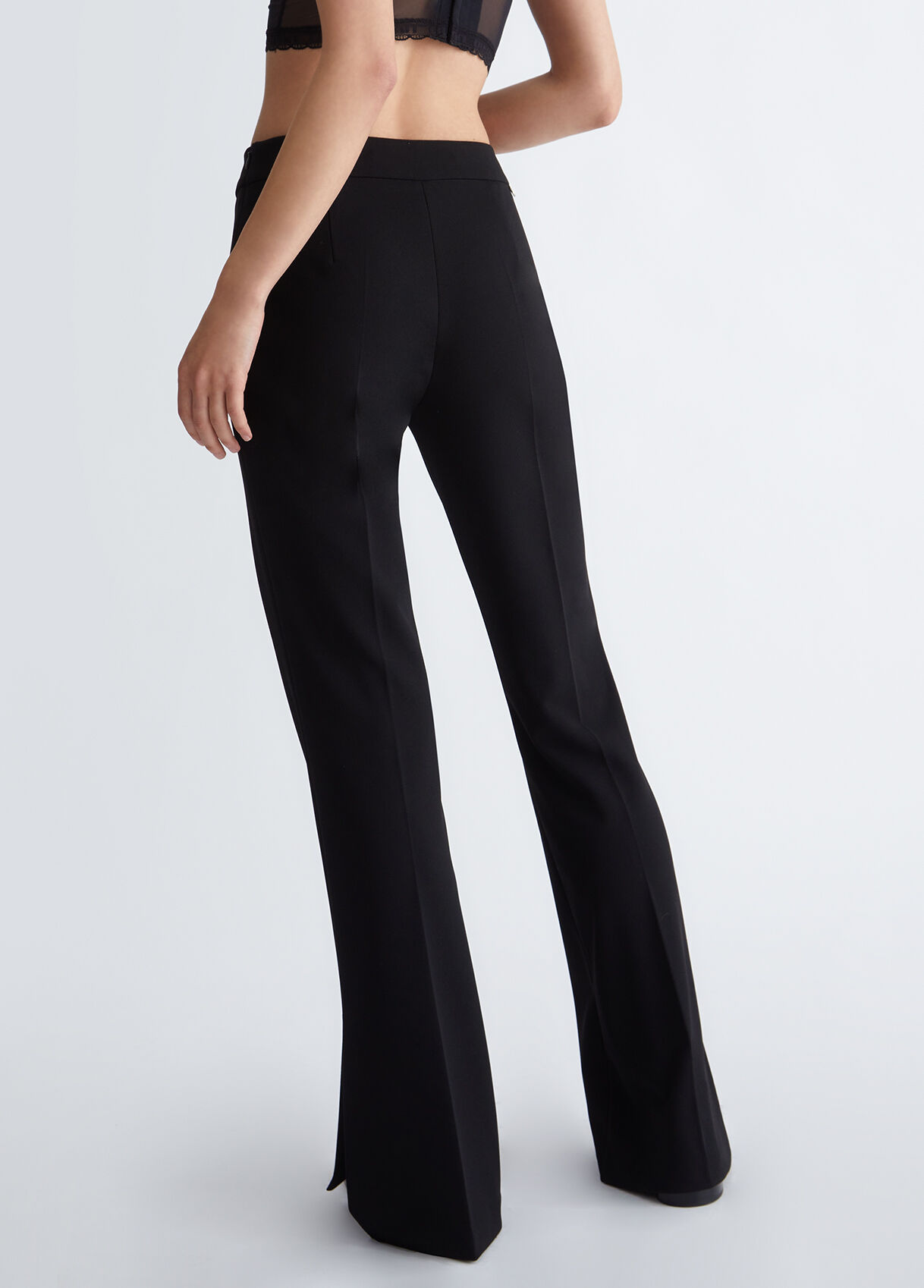 Flared trousers with slits