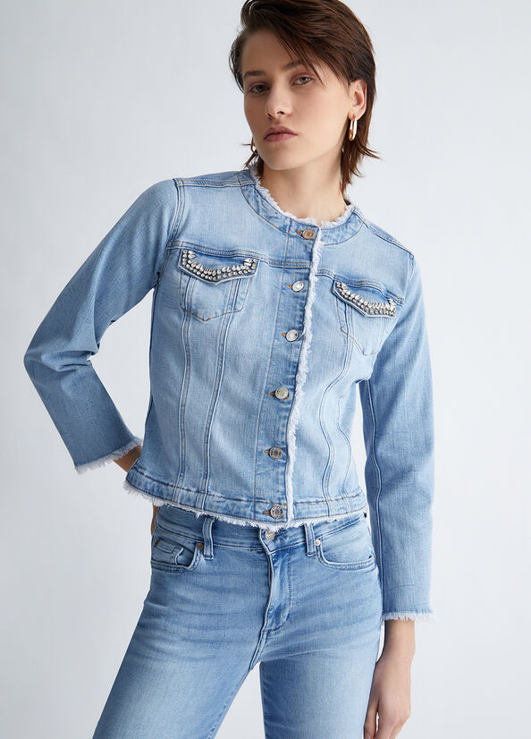 Giubbotto in denim con applicazioni