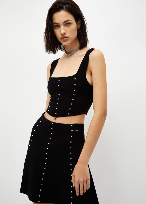 Top ecosostenibile con borchie