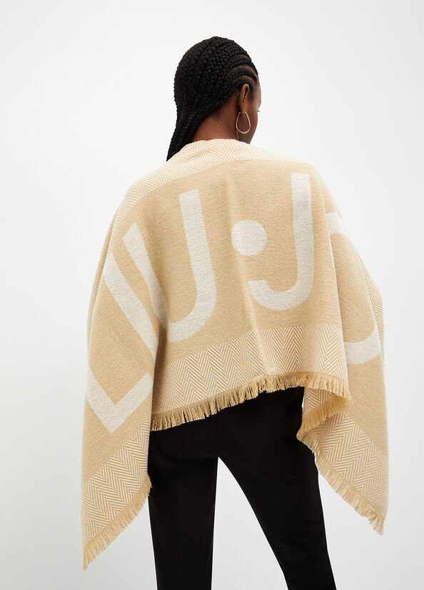 Poncho con logo jacquard