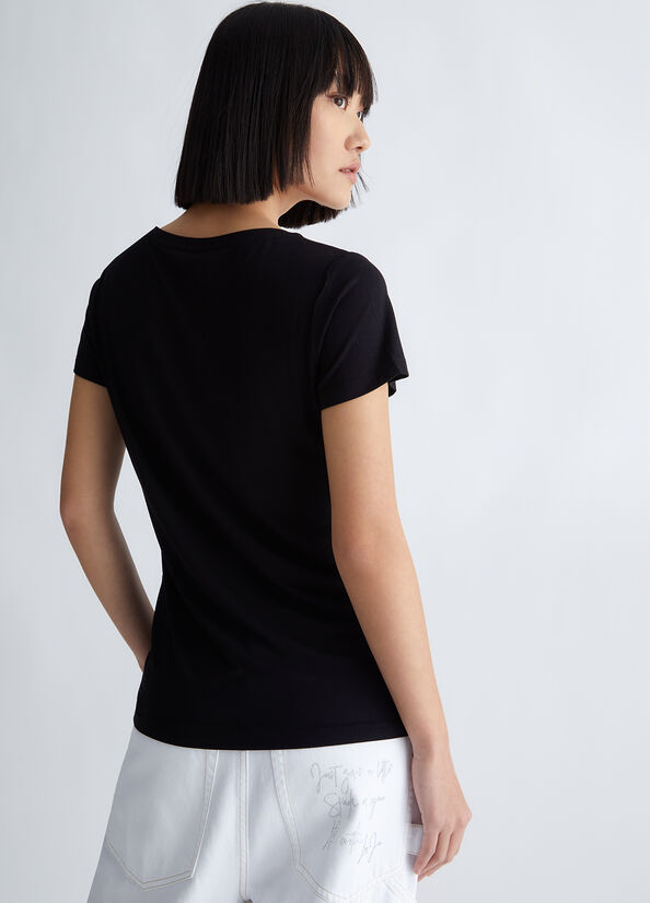 T-shirt con stampa tropical