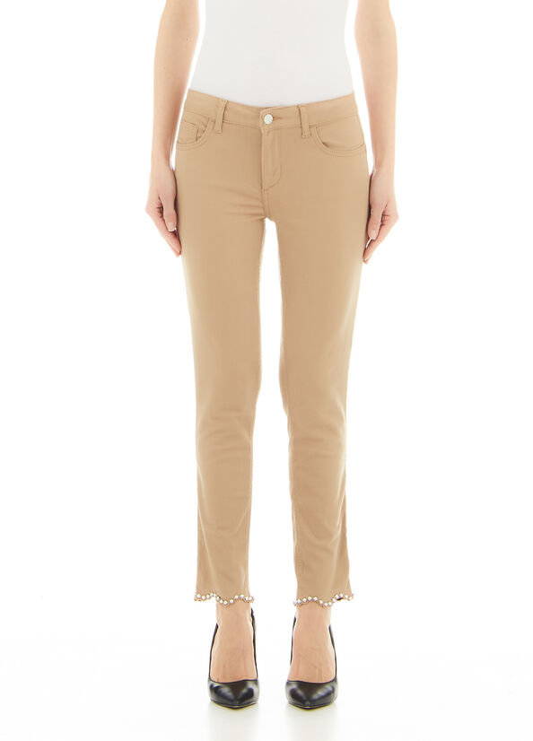 Pantalone skinny con applicazioni