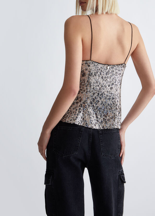 Top animalier con paillettes