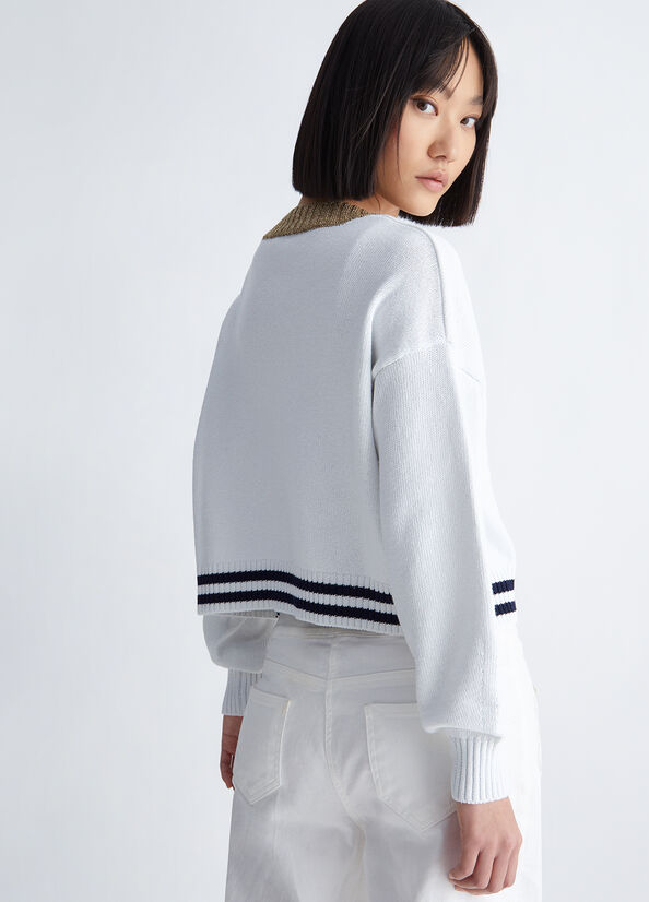 Cardigan con bottoni gioiello