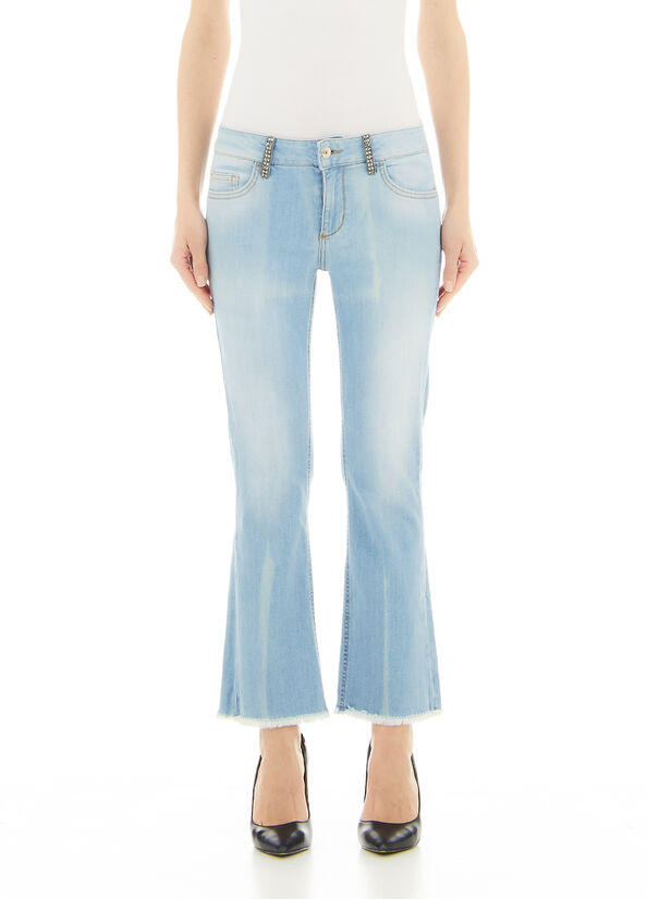 Jeans flare con glitter