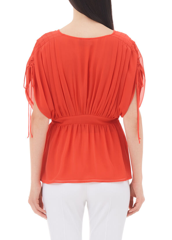 Top elegante in georgette